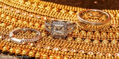 Indian wedding rings over kundan necklace. Indian wedding rings over kundan necklace.