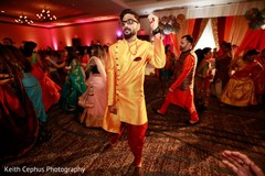 Indian groom at his sangeet party dance. Indian groom at his sangeet party dance.