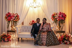 Sweet Indian couple posing at reception stage. Sweet Indian couple posing at reception stage.