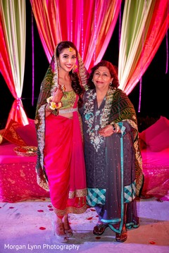 Lovely Indian bride posing with relative capture. Lovely Indian bride posing with relative capture.