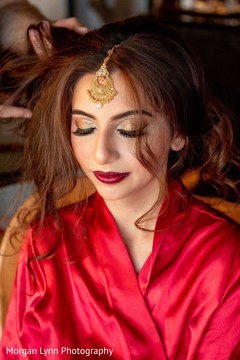 Enchanting Indian bride getting her hair done. Enchanting Indian bride getting her hair done.