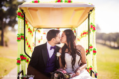Indian groom kissing the bride photo. Indian groom kissing the bride photo.