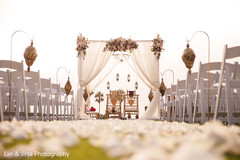 Indian wedding ceremony mandap flowers and lanterns decor. Indian wedding ceremony mandap flowers and lanterns decor.