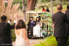 Indian couple leaving the ceremony photo. Indian couple leaving the ceremony photo.