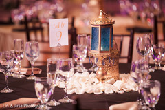 Elegant Indian wedding table number and lanterns. Elegant Indian wedding table number and lanterns.
