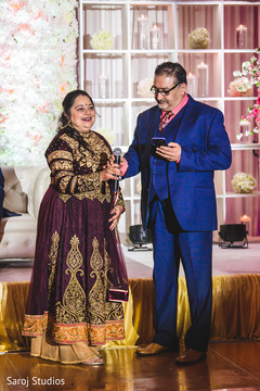 Indian bridal relatives at reception speech. Indian bridal relatives at reception speech.