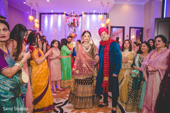 Lovely Indian bride walking in to wedding ceremony. Lovely Indian bride walking in to wedding ceremony.
