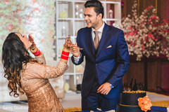 Indian couple sharing cake capture. Indian couple sharing cake capture.