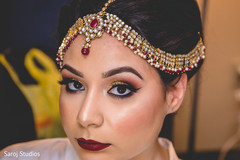 Enchanting Indian bride ceremony makeup and matha patti. Enchanting Indian bride ceremony makeup and matha patti.