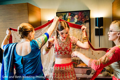 Indian bride getting her ghoonghat on. Indian bride getting her ghoonghat on.