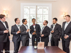 Groomsmen and groom having a smoke Groomsmen and groom having a smoke