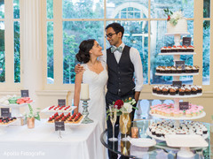 Indian lovebirds cutting the cake moment Indian lovebirds cutting the cake moment
