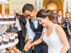 Indian newlyweds cutting the cake scene. Indian newlyweds cutting the cake scene.