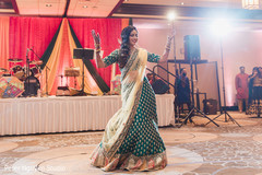 Indian bride performing at the venue Indian bride performing at the venue