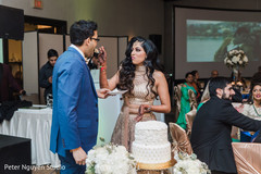 Maharani sharing a slice of cake with Raja Maharani sharing a slice of cake with Raja