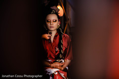 Indian bride getting her ceremony makeup done. Indian bride getting her ceremony makeup done.