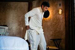 Indian groom putting his Dhoti Kurta. Indian groom putting his Dhoti Kurta.