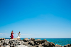 Sweet shot of bride and groom by the beach. Sweet shot of bride and groom by the beach.