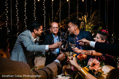 Elegant Indian groom with groomsmen and parent at reception party. Elegant Indian groom with groomsmen and parent at reception party.