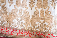 Closeup capture of maharani's golden lehenga elephants embroidery. Closeup capture of maharani's golden lehenga elephants embroidery.