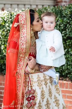 Maharani kissing lovely Indian wedding guest capture. Maharani kissing lovely Indian wedding guest capture.