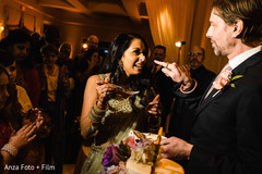 Sweet Indian couple cutting cake scene. Sweet Indian couple cutting cake scene.