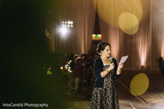 Indian bridesmaid at her reception speech. Indian bridesmaid at her reception speech.