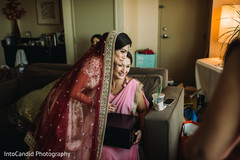 Joyful Indian bride getting ready capture. Joyful Indian bride getting ready capture.