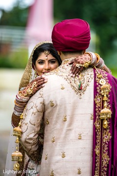 Indian bride and groom having a tender moment Indian bride and groom having a tender moment