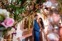 Indian bride and groom posing for pictures Indian bride and groom posing for pictures