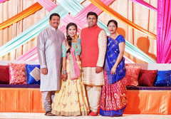 Enchanting Indian couple with relatives. Enchanting Indian couple with relatives.