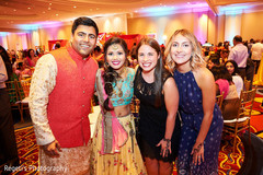 Enchanting Indian couple with sangeet guests. Enchanting Indian couple with sangeet guests.