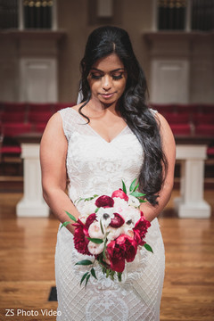 Dreamy Indian bride in white wedding dress. Dreamy Indian bride in white wedding dress.