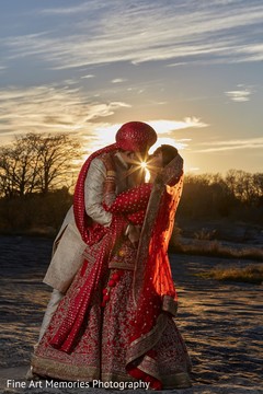 Indian bride and groom kissing Indian bride and groom kissing