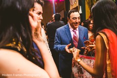 Indian bride receiving presents at pre-wedding celebration. Indian bride receiving presents at pre-wedding celebration.