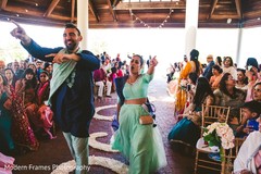 Glamorous Indian bridesmaid walking in with groomsmen. Glamorous Indian bridesmaid walking in with groomsmen.