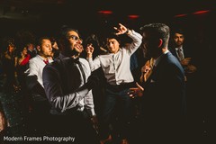 Upbeat Indian guests at reception dance. Upbeat Indian guests at reception dance.