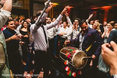 Upbeat Indian wedding reception dance with dhol player. Upbeat Indian wedding reception dance with dhol player.