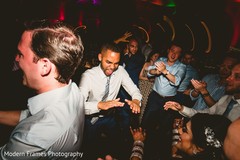 Indian groomsmen rocking the reception dance floor. Indian groomsmen rocking the reception dance floor.