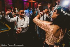 Indian couple rocking the dancefloor. Indian couple rocking the dancefloor.