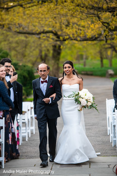 Indian bride and family guests entering the ceremony Indian bride and family guests entering the ceremony