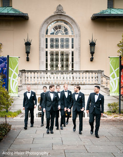 Indian groom and groomsmen posing for pictures Indian groom and groomsmen posing for pictures