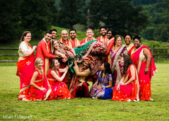Lovely Indian couple outdoors with bridesmaids and groomsmen. Lovely Indian couple outdoors with bridesmaids and groomsmen.