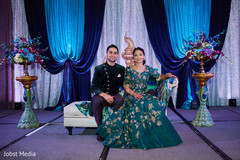 Indian couple posing at their sangeet. Indian couple posing at their sangeet.