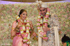 Indian bride and groom exchanging garlands ceremony. Indian bride and groom exchanging garlands ceremony.
