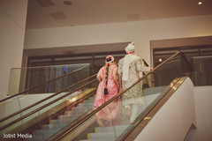 Indian bride and groom walking hand in hand. Indian bride and groom walking hand in hand.