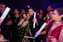 Upbeat indian wedding guests dance. Upbeat indian wedding guests dance.