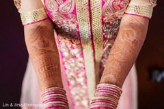 Beautiful Indian bride showing henna art Beautiful Indian bride showing henna art