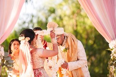 Couple Exchanges Floral Garlands Couple Exchanges Floral Garlands