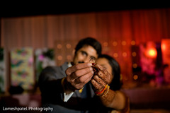 Indian bride and groom showing their mehndi Indian bride and groom showing their mehndi